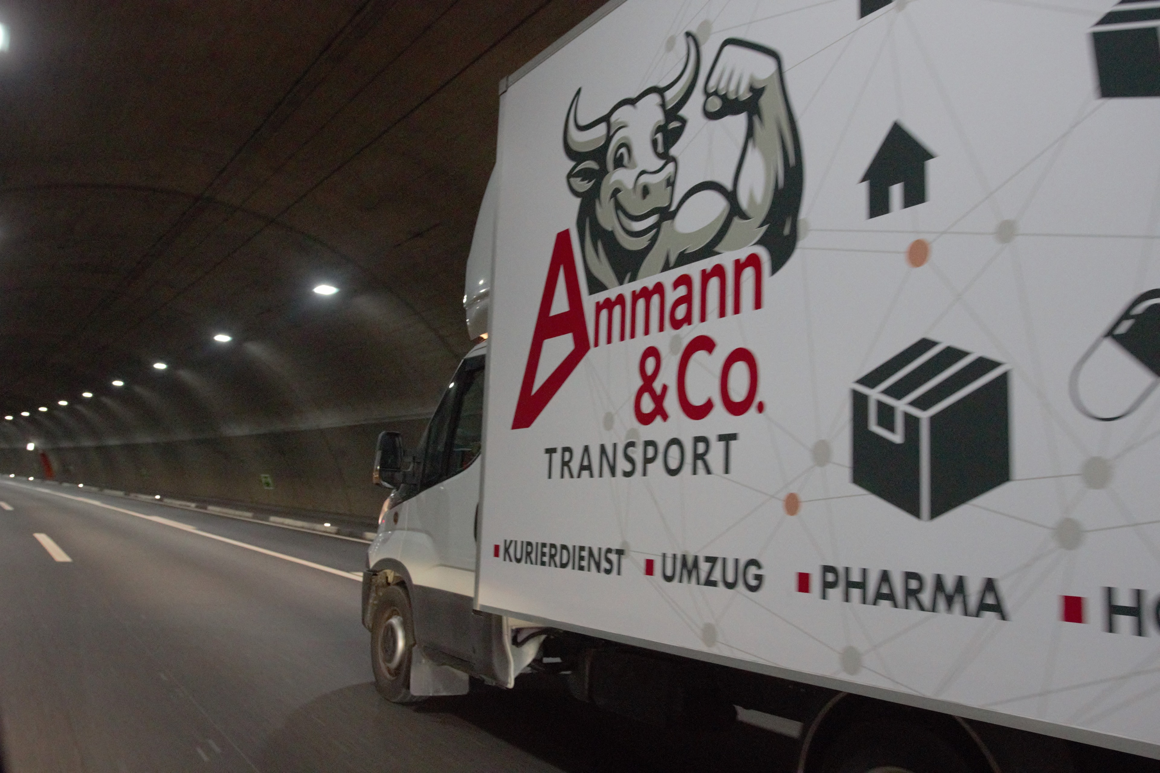 Ammann & Co. Transport Truck in Tunnel
